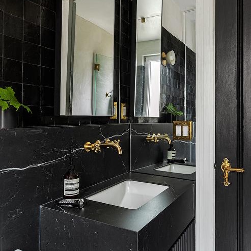 gold-and-black-bathroom-with-black-marble 2.jpg